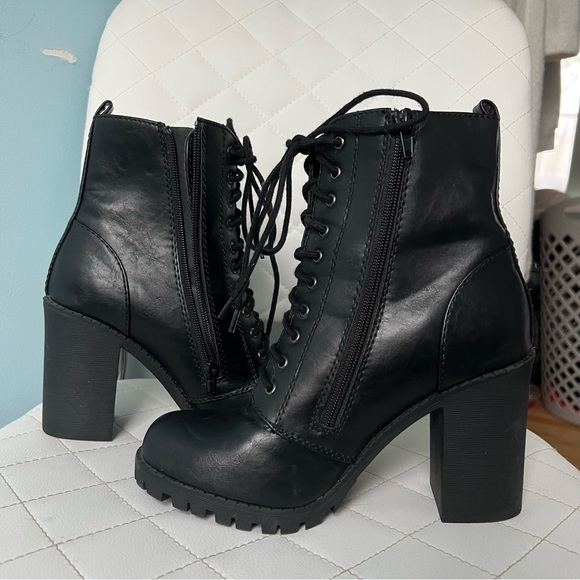 Soda Shoes - Black leather 3 1/2 inch heeled booties.